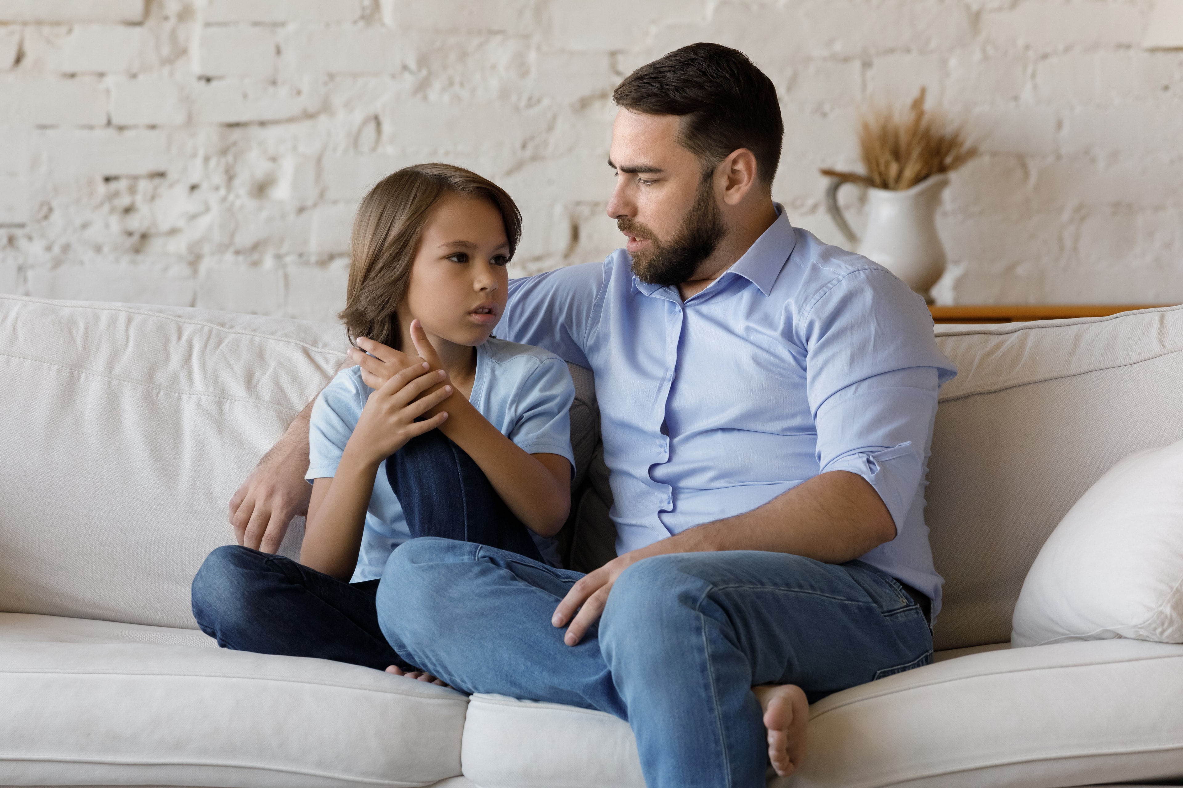 Dad listening to child