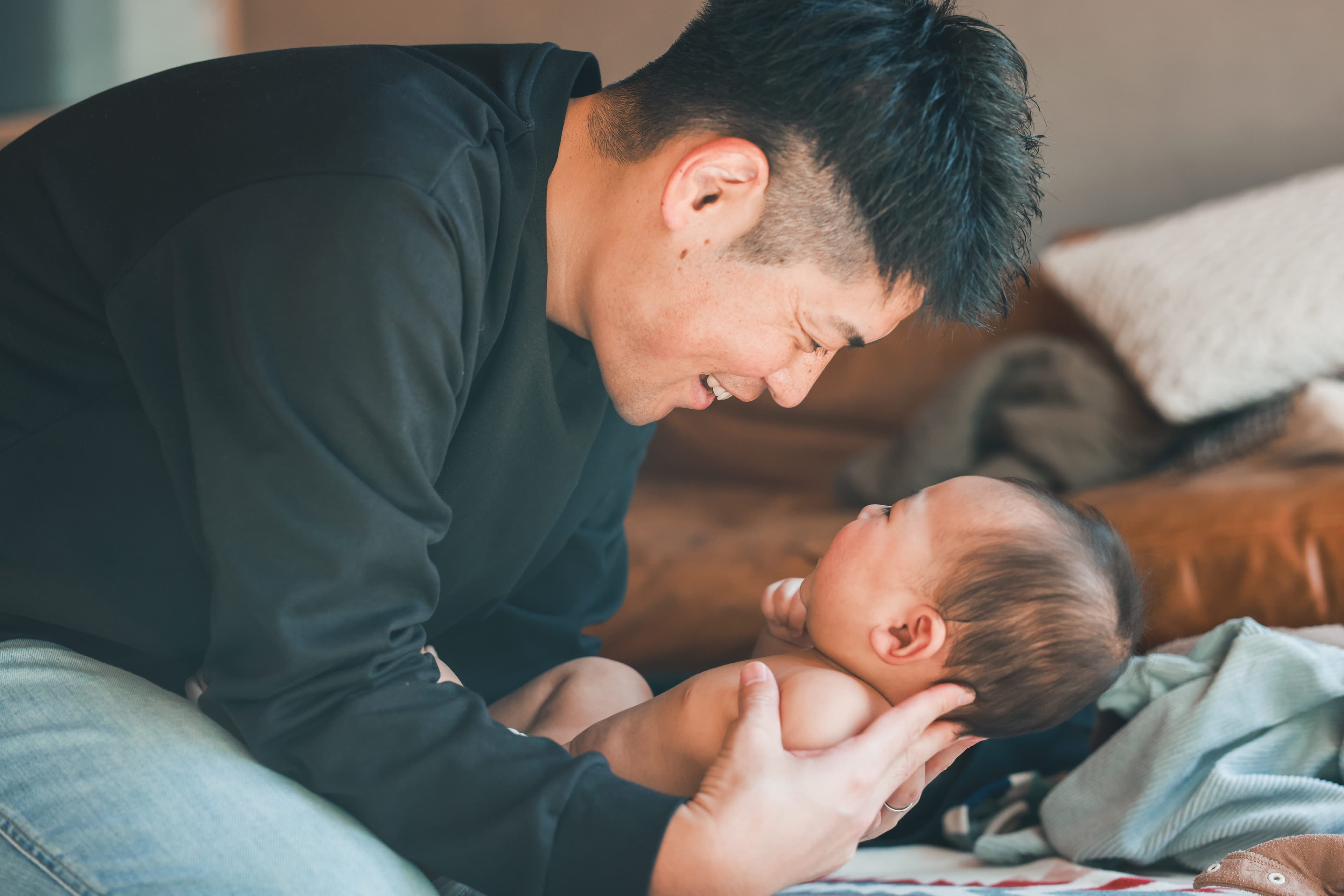 Dad with newborn baby