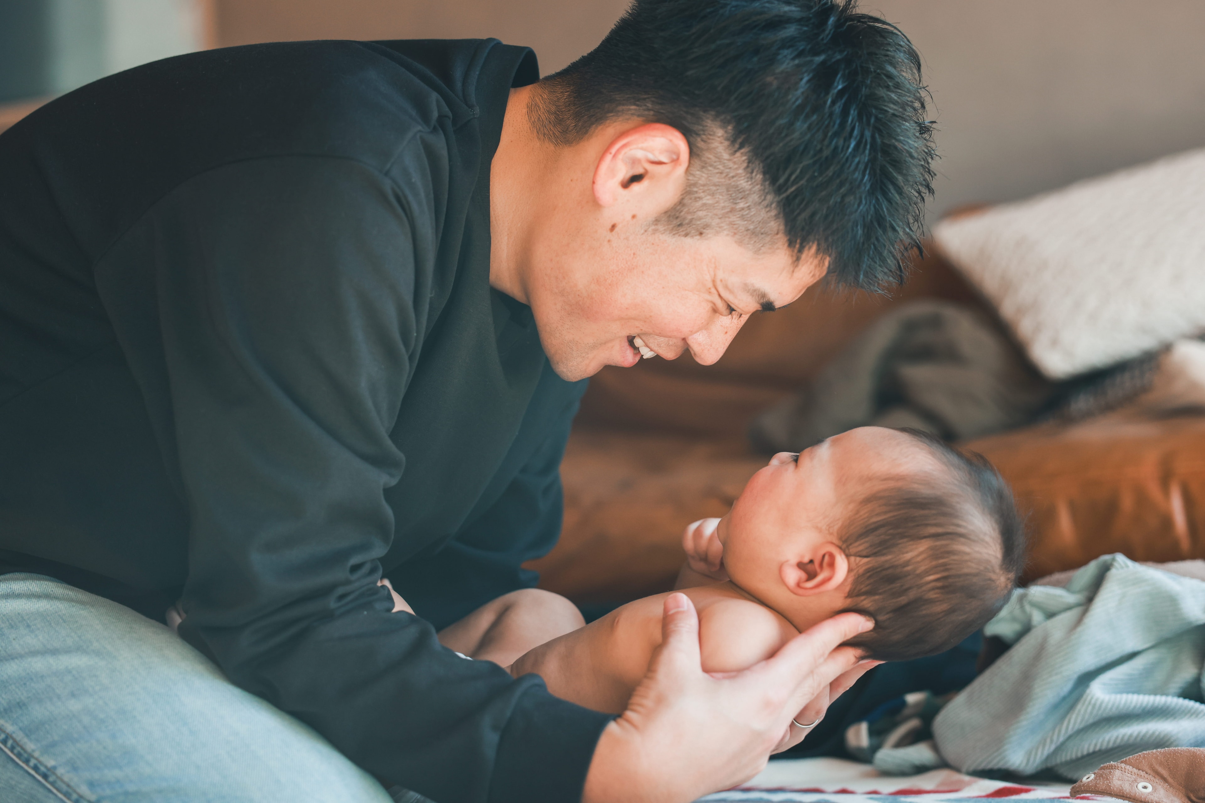 Dad with newborn baby