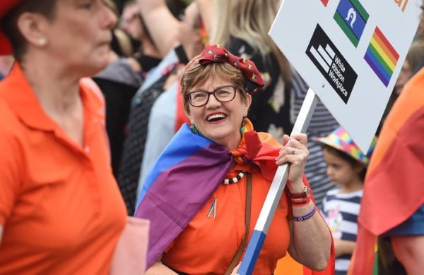 Wendy Sturgess happily carrying pride sign