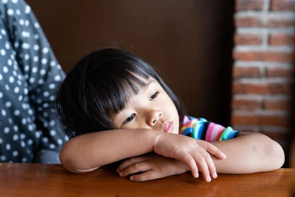 Tired young child - family violence