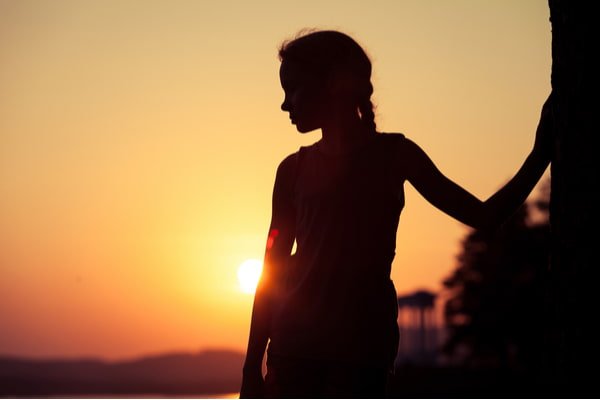 Sunset child holding parent hand services for families