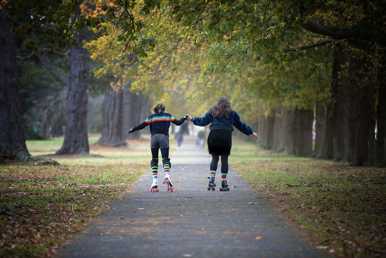 Foster Care Cafs female and child rollerblading