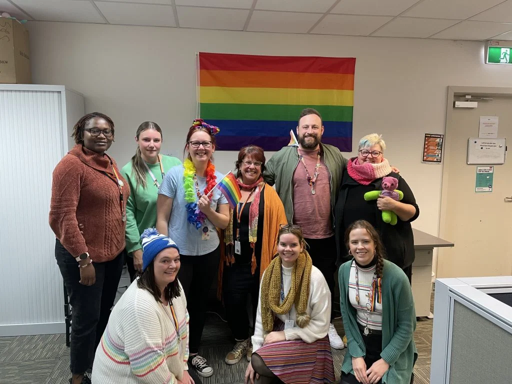 Group of Cafs people celebrating IDAHOBIT Day