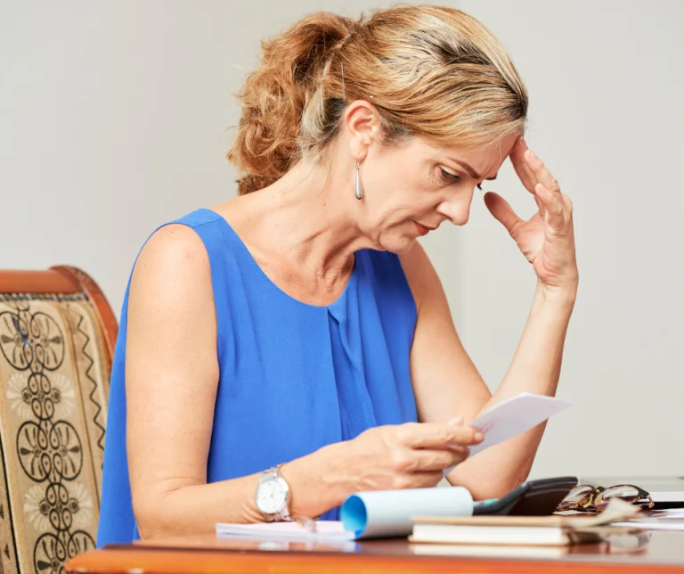 Women looking at papers on a table